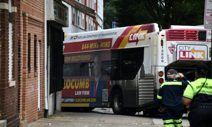 16 Injured as Baltimore Bus Crashes Into 2 Cars, Apartment Building