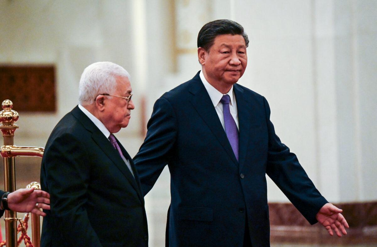 Chinese leader Xi Jinping (R) and Palestinian leader Mahmud Abbas attend a welcoming ceremony in Beijing on June 14, 2023. (Jade Gao/Pool via Getty Images)