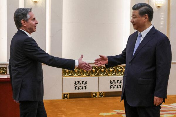 U.S. Secretary of State Antony Blinken shakes hands with China's leader Xi Jinping in the Great Hall of the People in Beijing on June 19, 2023. (Leah Millis/AFP via Getty Images)