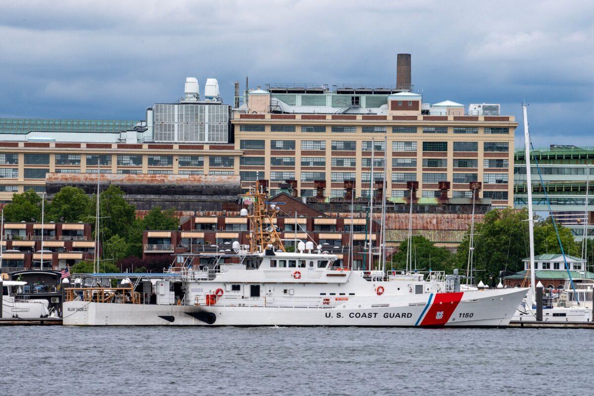 A US Coast Guard vessel sits in port in Boston Harbor across from the US Coast Guard Station Boston in Boston, Massachusetts, on June 19, 2023. (Joseph Prezioso/AFP/Getty Images)