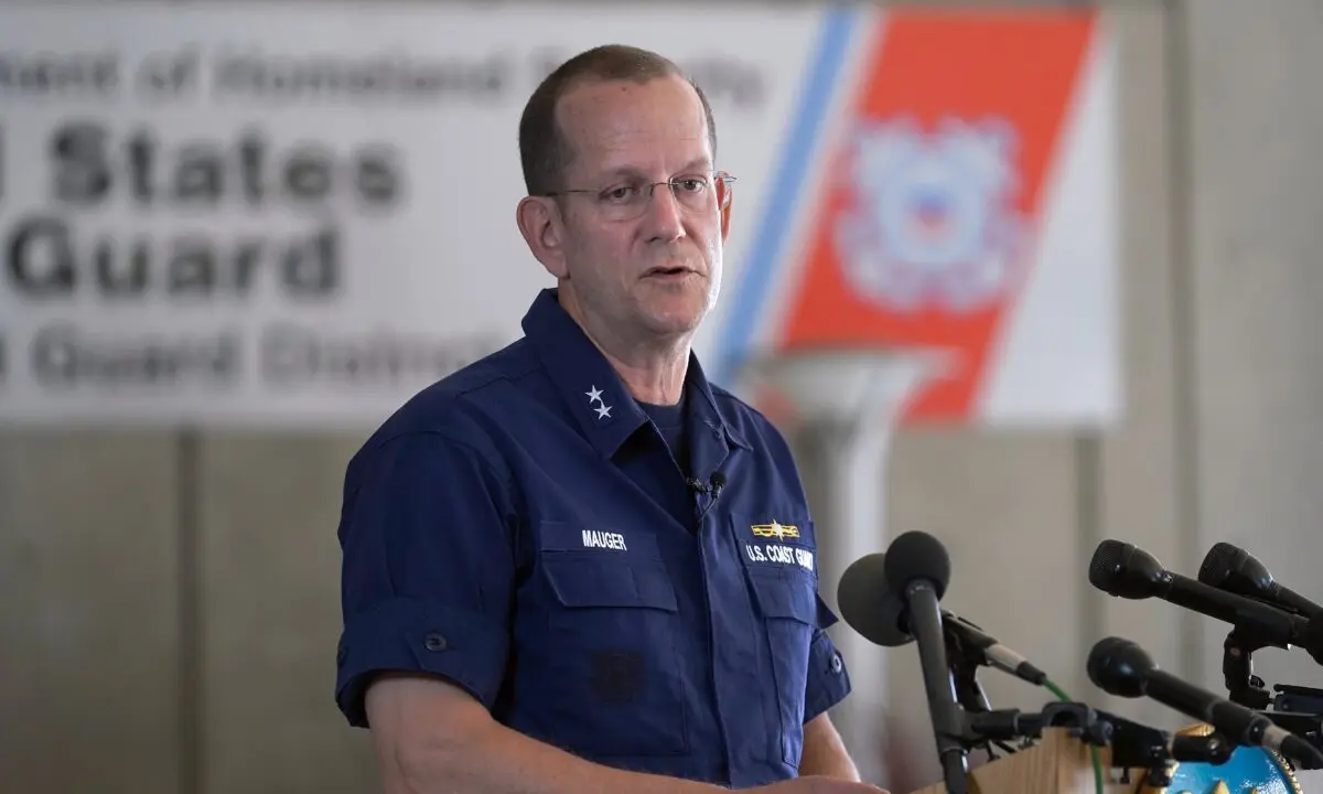U.S. Coast Guard Rear Adm. John Mauger speaks to the media in Boston, Mass., on June 19, 2023. (AP Photo/Steven Senne)
