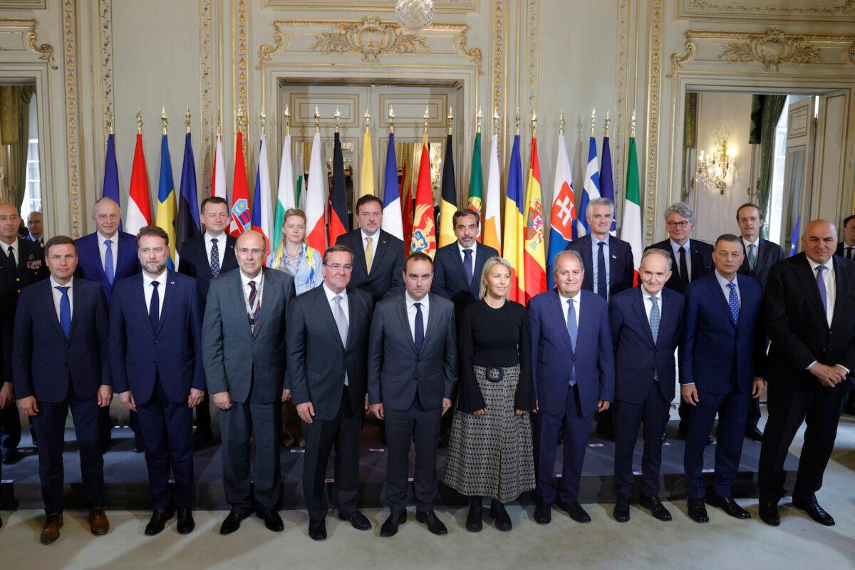 French Defense Minister Sébastien Lecornu (center) poses with his counterparts during the European Air Defense Conference at Les Invalides monument in Paris on June 19, 2023. (Geoffroy Van der Hasselt/AP Photo)