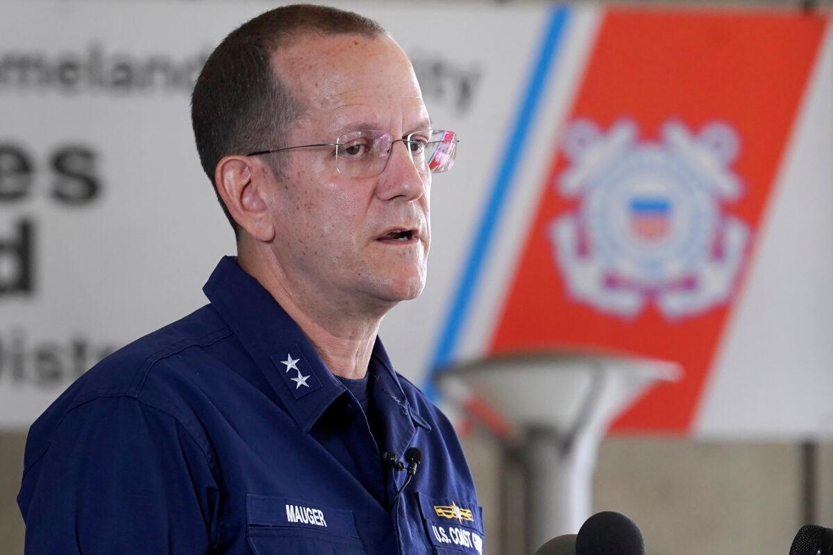 U.S. Coast Guard Rear Adm. John Mauger, commander of the First Coast Guard District, talks to the media in Boston on June 19, 2023. (Steven Senne/AP Photo)