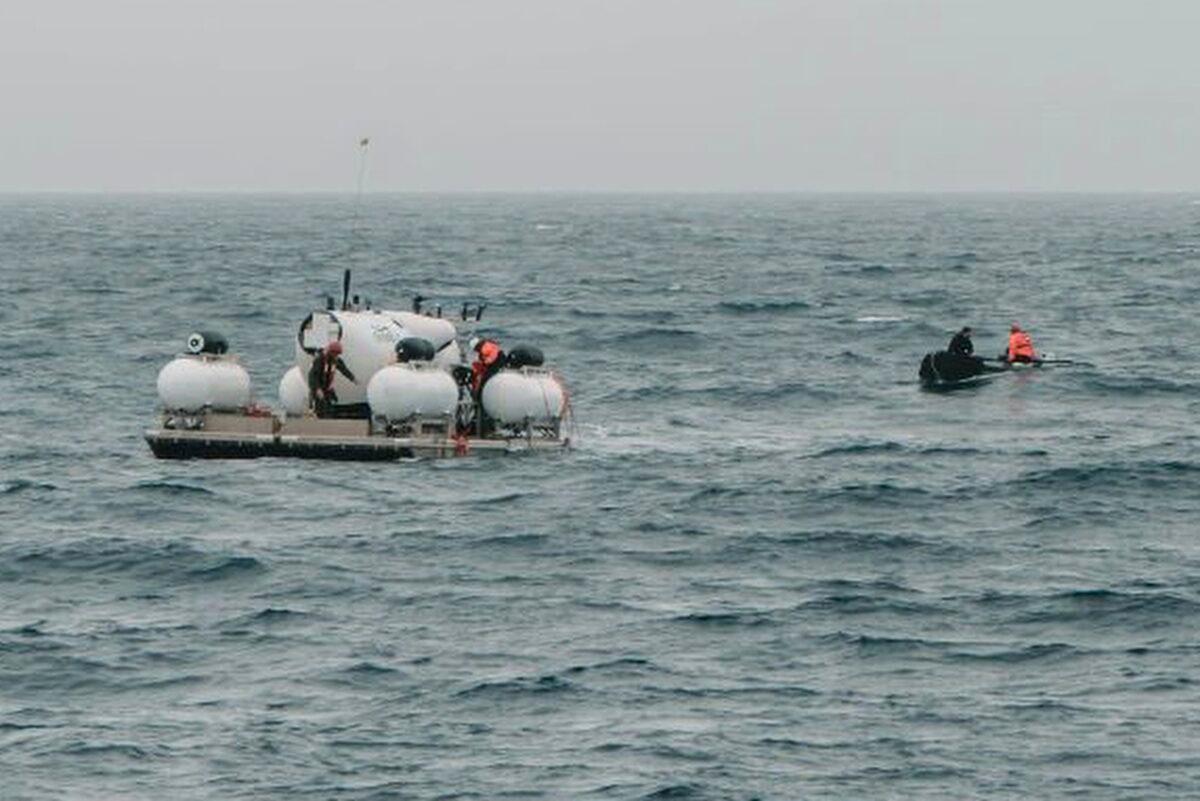 The submersible Titan is prepared for a dive into a remote area of the Atlantic Ocean on an expedition to the Titanic on June 18, 2023. (Action Aviation via AP)