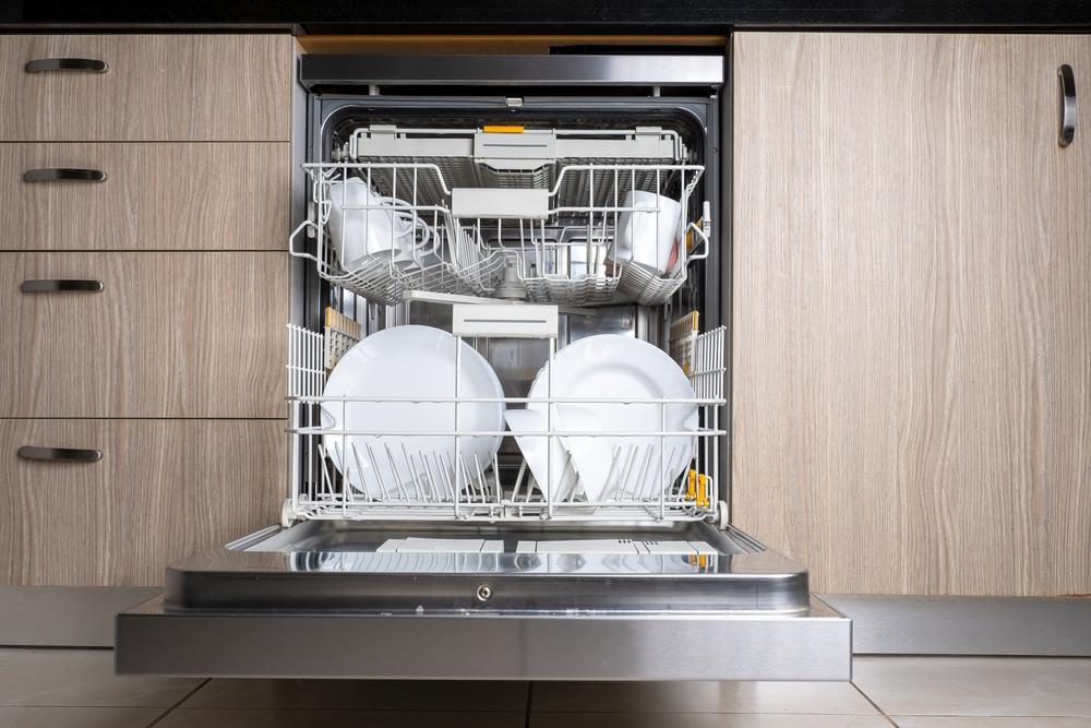 Keeping the dishwasher's filter, gasket seal, and spray arms clean will ensure sparkling dishes. (Oxanaso/Shutterstock)