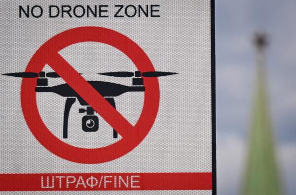 A "No Drone Zone" sign prohibiting unmanned aerial vehicles flying over the area is seen in central Moscow on June 21, 2023. (Natalia Kolesnikova/AFP via Getty Images)