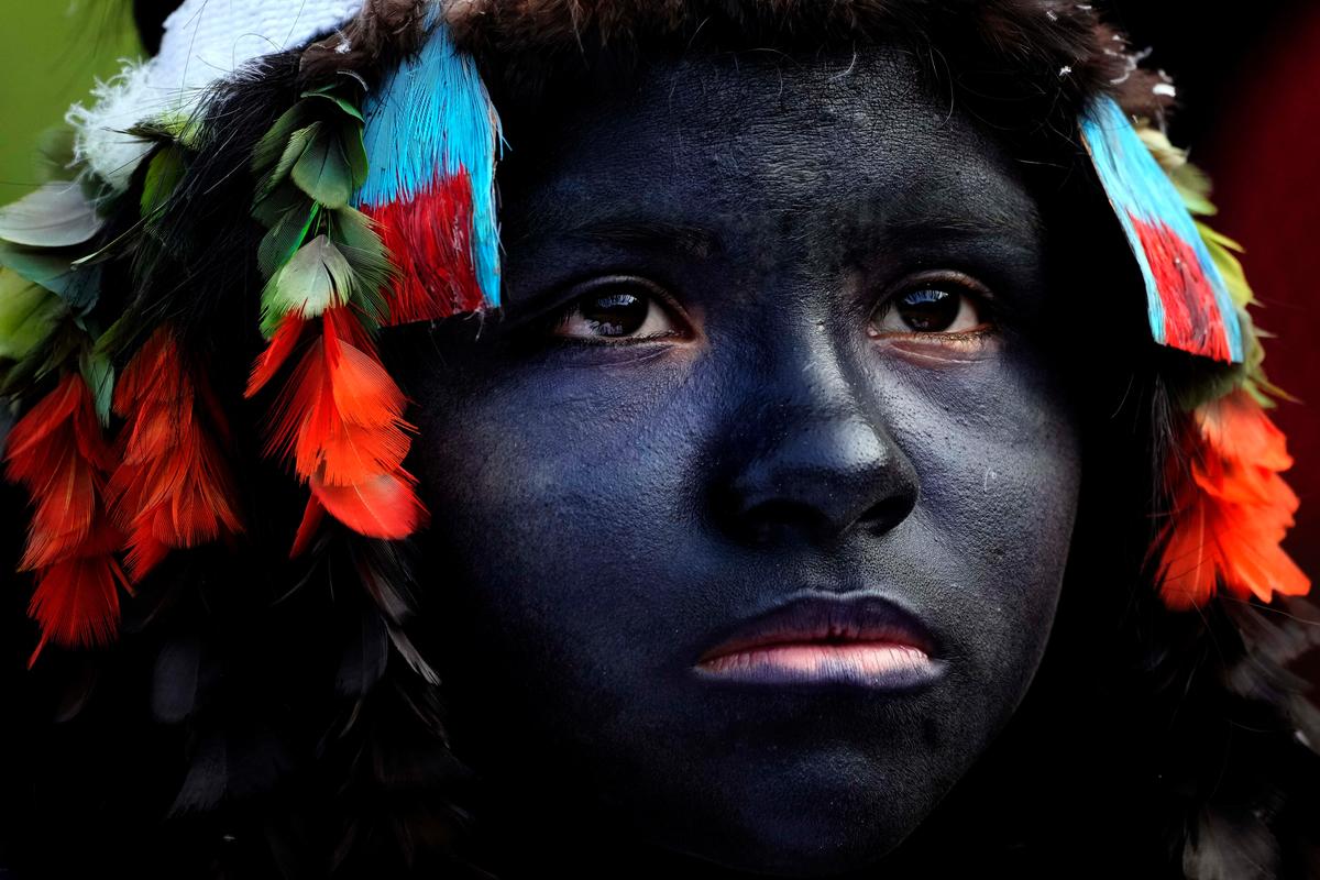 A Tembé Tenehara adolescent girl partakes in the Wyra’whaw rite of passage in Brazil's Amazon rainforest. (Eraldo Peres/AP Photo)