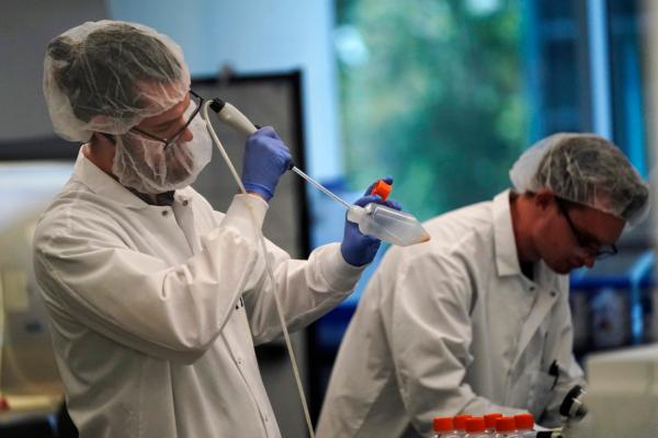 Scientists work in a bioprocess lab at Eat Just in Alameda, Calif., on June 14, 2023. (AP Photo/Jeff Chiu)