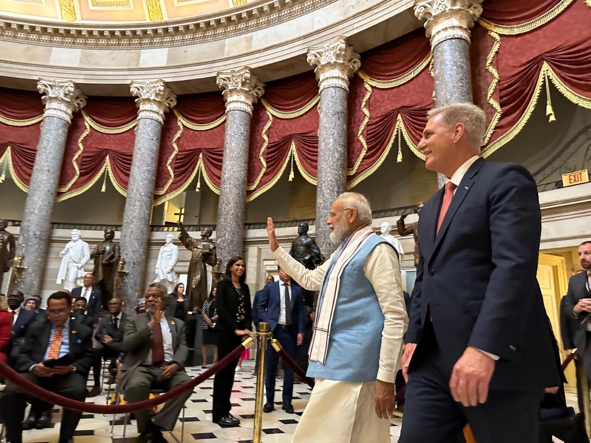 Indian Prime Minister Narendra Modi and House Speaker Kevin McCarthy (R-Calif.) walk through Statuary Hall on Capitol Hill in Washington, D.C., on June 22, 2023. Credit: Jackson Richman/The Epoch Times.
