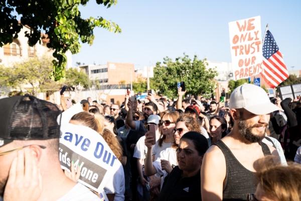 The Glendale Unified School Board’s final meeting of the school year draws dozens of parents, community members, and activists protesting over the district’s policies on LGBT content in schools in Glendale, Calif., on June 20, 2023. (Courtesy of Hasmik Bezirdzhyan)