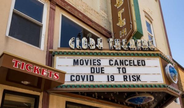 A marquee on a small town movie theater in the Midwest U.S. says closed due to the COVID-19 pandemic, in Greenville, Ill., on April 1, 2020. (Laurie A. Smith/Shutterstock)