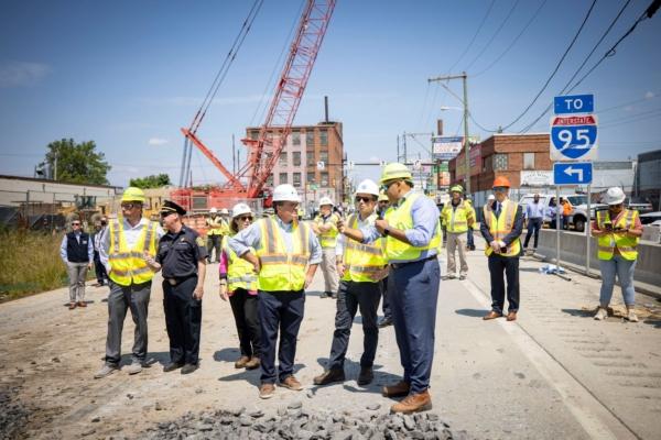 Secretary of Transportation Pete Buttigieg visits the site of a collapsed section of Interstate 95, in Philadelphia, on June 13, 2023. (Commonwealth Media Service)
