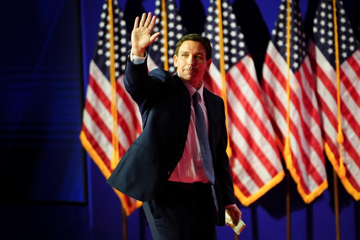Republican presidential candidate Gov. Ron DeSantis (R-Fla.) waves his hand as he leaves the stage at the Faith and Freedom Road to Majority conference at the Hilton in Washington on June 23, 2023. (Madalina Vasiliu/The Epoch Times)