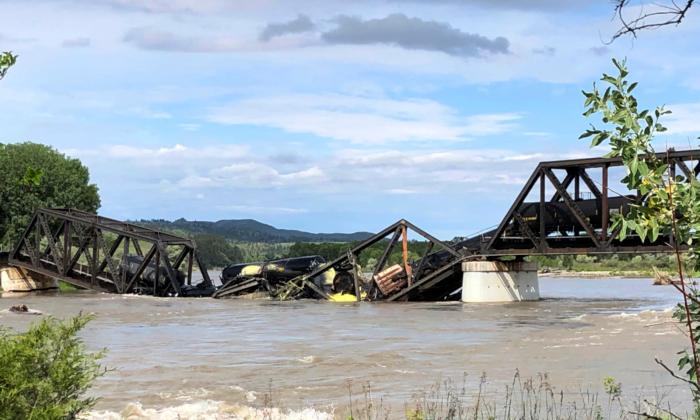 A Bridge Over Yellowstone River Collapses, Sending a Freight Train Into the Waters Below