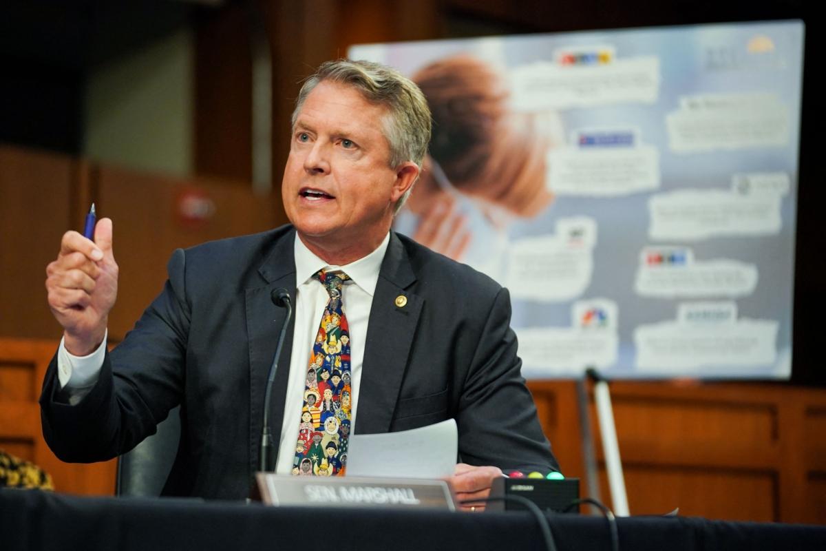 Sen. Roger Marshall (R-Kans.) asks questions during a Senate Health, Education, Labor, and Pensions Committee hearing to discuss reopening schools during the COVID-19 pandemic in Washington on Sept. 30, 2021. (Greg Nash/POOL/AFP via Getty Images)
