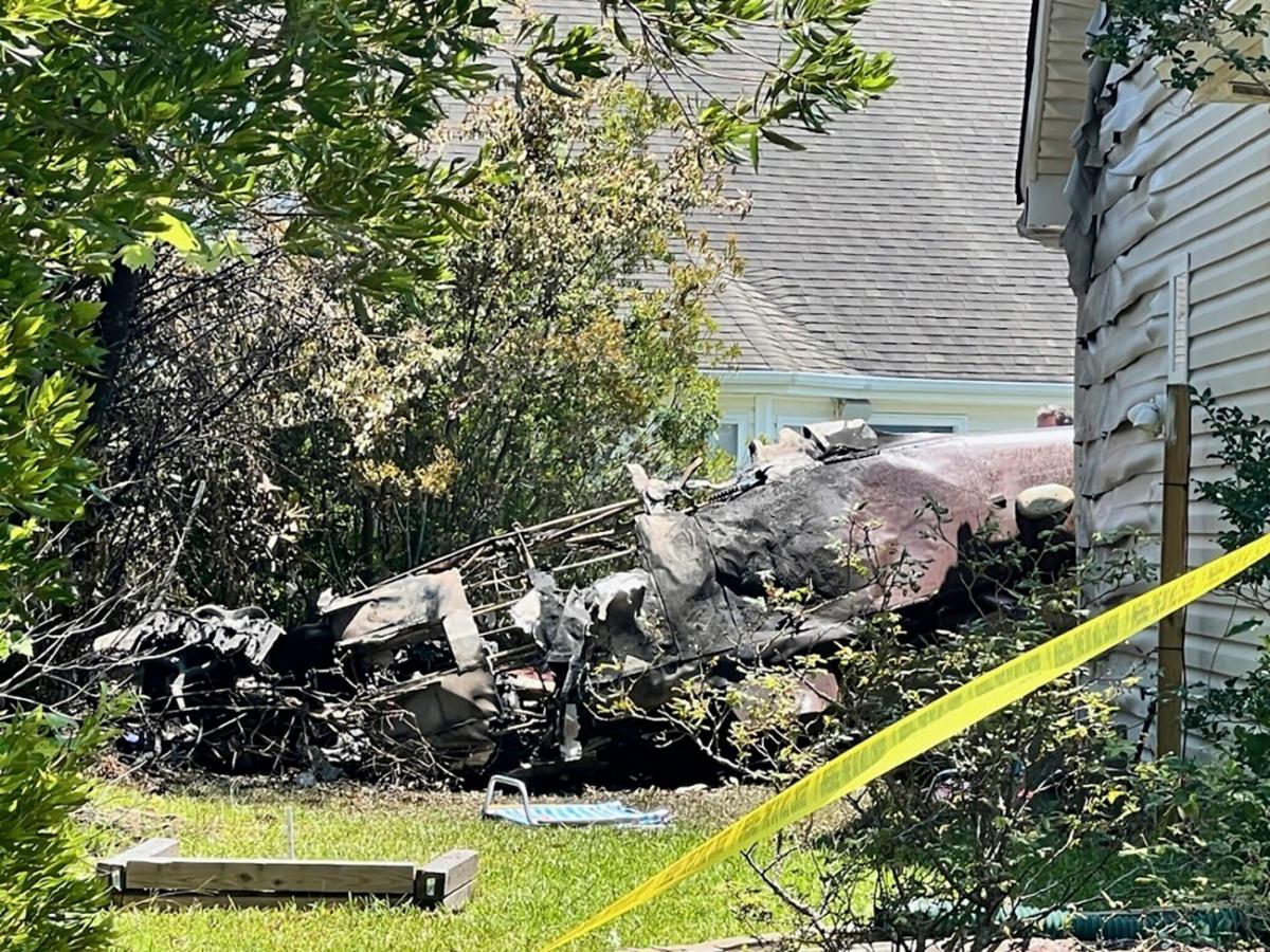 The wreckage of the plane that crashed on June 25 in a neighborhood at Frying Pan Road, in Southport, N.C., on June 26, 2023. (Renee Spencer/The Star-News via AP)