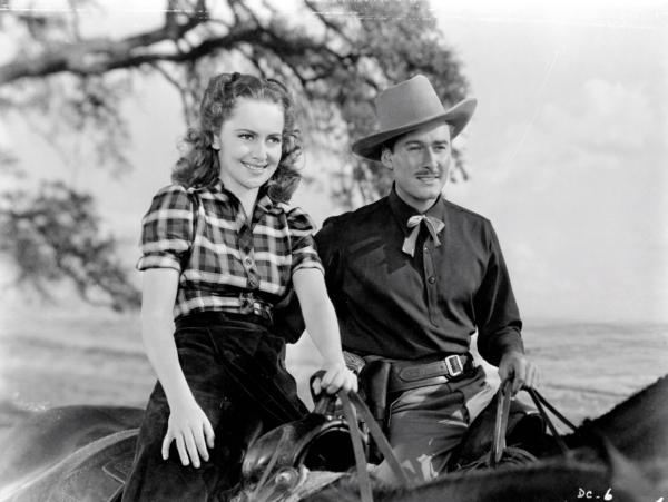Abbie Irving (Olivia de Havilland) and Wade Hatton (Errol Flynn) in “Dodge City.” (MovieStillsDB)