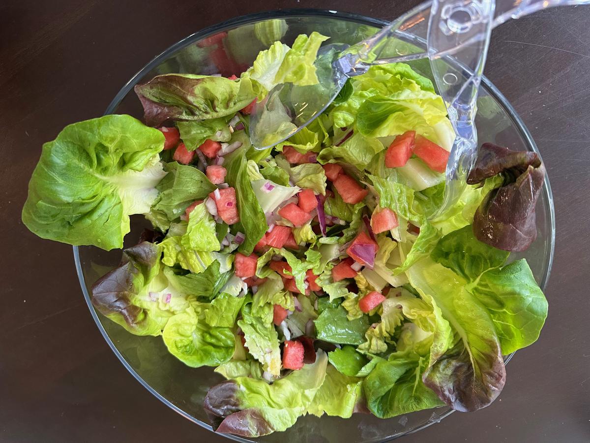 The core of this recipe is to add watermelon to salad, along with Shania’s vinegar and sugar dressing. (Ari LeVaux)