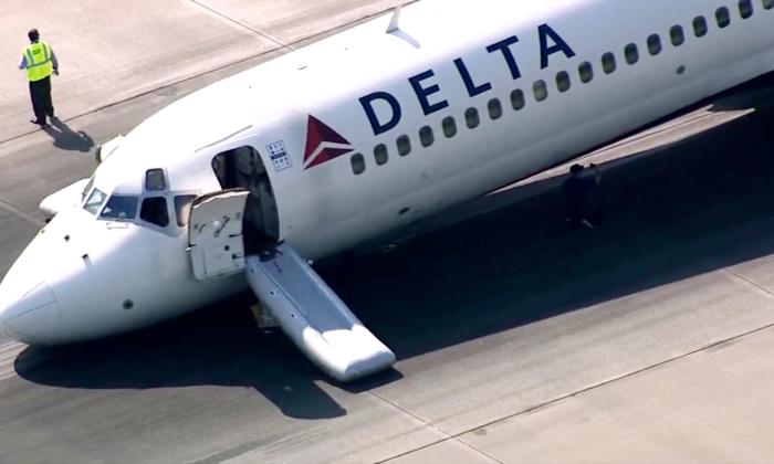 Delta Plane Lands With Nose on Runway at Charlotte Airport