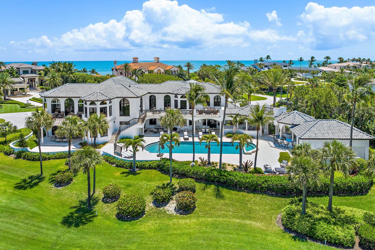 The textbook Florida setting has the home directly on the golf course, just a stone’s throw from the beach. (Courtesy of Andy Frame and Adam Dooms)