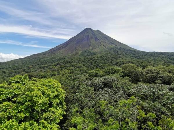 Arenal Volcano in Costa Rica is surrounded by a thriving adventure tourism industry and coffee plantations. Photo taken on June 12, 2023. (Autumn Spredemann/The Epoch Times)