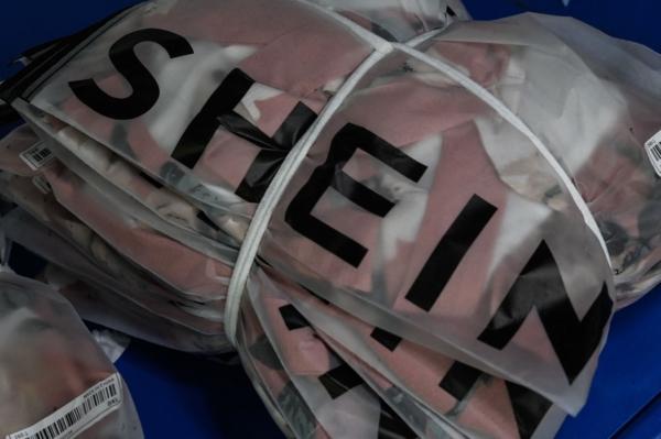 The signage of cross-border fast-fashion e-commerce company Shein at a garment factory in Guangzhou, in China's southern Guangdong Province, on July 18, 2022. (Jade Gao/AFP via Getty Images)