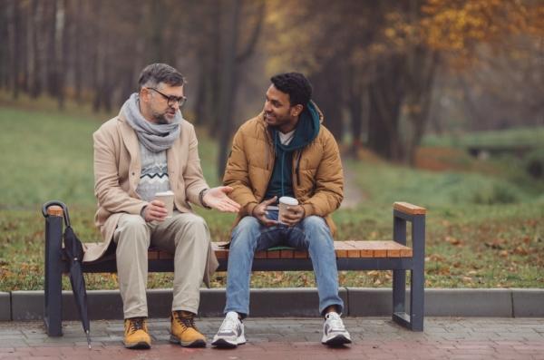 The "Bench Play" features two men on a park bench. (Dmytro Sheremeta/Shutterstock)