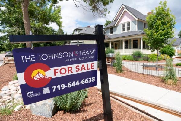 A 'For Sale' sign stands outside a home in Colorado Springs, Colo., on June 22, 2023. (David Zalubowski/AP Photo)