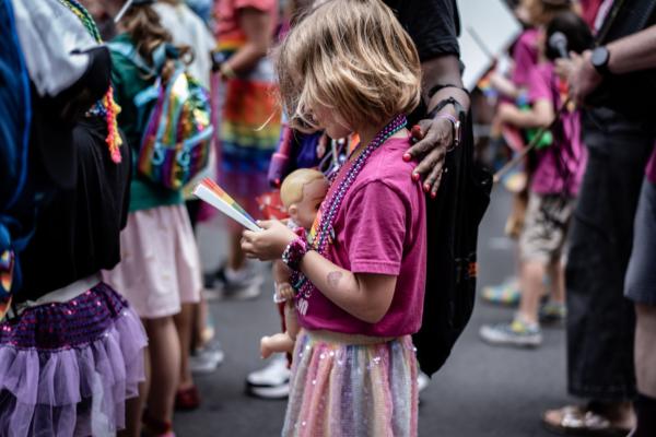  A young girl at the annual New York City Pride March in New York City, on June 25, 2023. (Samira Bouaou/The Epoch Times)