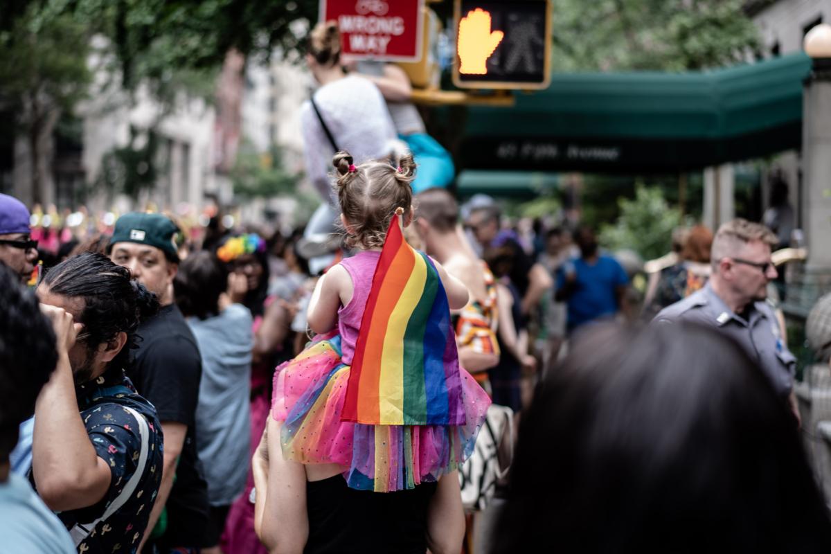 A young girl at the annual New York City Pride March in New York City on June 25, 2023. (Samira Bouaou/The Epoch Times)