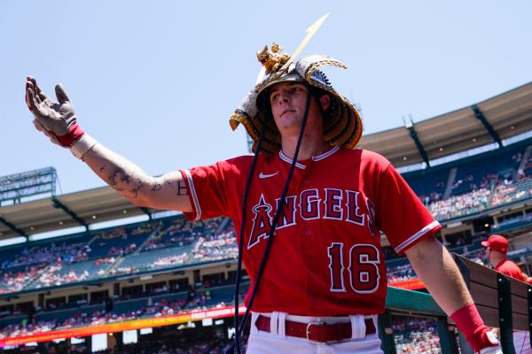 Los Angeles Angels' Mickey Moniak (16) celebrates in the dugout after hitting a home run during the first inning of a baseball game against the Chicago White Sox in Anaheim, Calif., on June 29, 2023. (Ashley Landis/AP Photo)