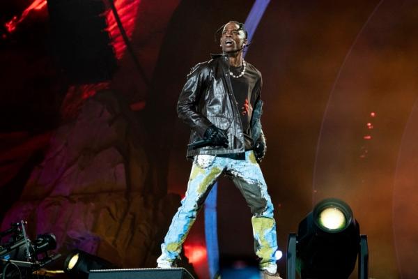 Travis Scott performs at Day 1 of the Astroworld Music Festival at NRG Park in Houston on Nov. 5, 2021. (Amy Harris/Invision/AP)