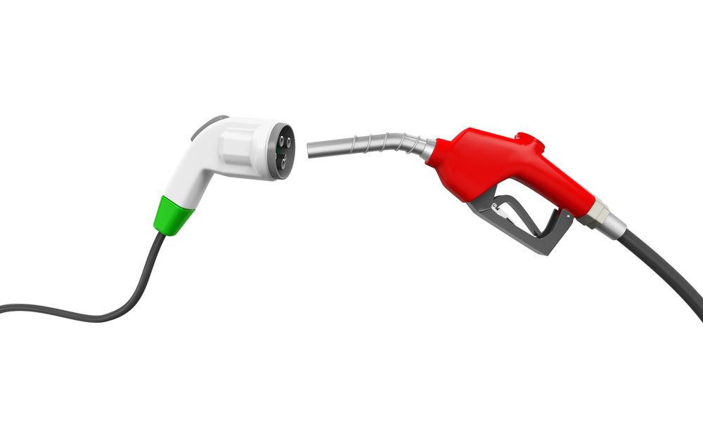 Connecting an EV to a recharging power cable is very similar to using a traditional fuel nozzle at a gasoline station.(Nerthuz/Shutterstock)