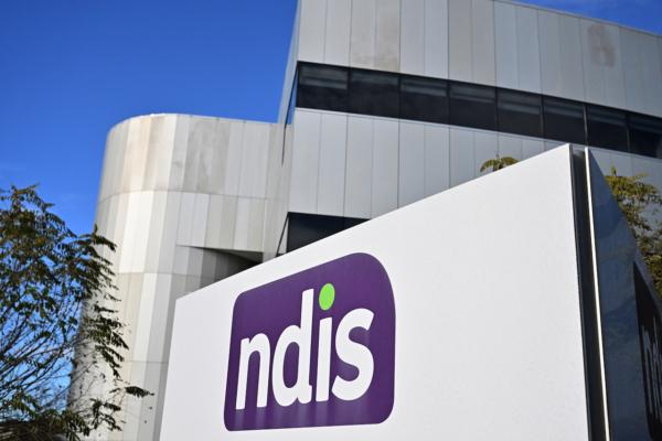 The National Disability Insurance Scheme NDIS logo is seen at the head office in Canberra on June 22, 2022. (AAP Image/Mick Tsikas)