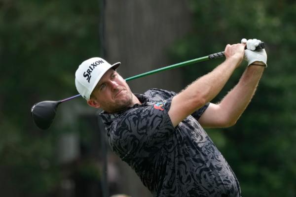 Taylor Pendrith drives off the fourth tee during the second round of the Rocket Mortgage Classic golf tournament at Detroit Country Club in Detroit on June 30, 2023. (AP Photo/Carlos Osorio)