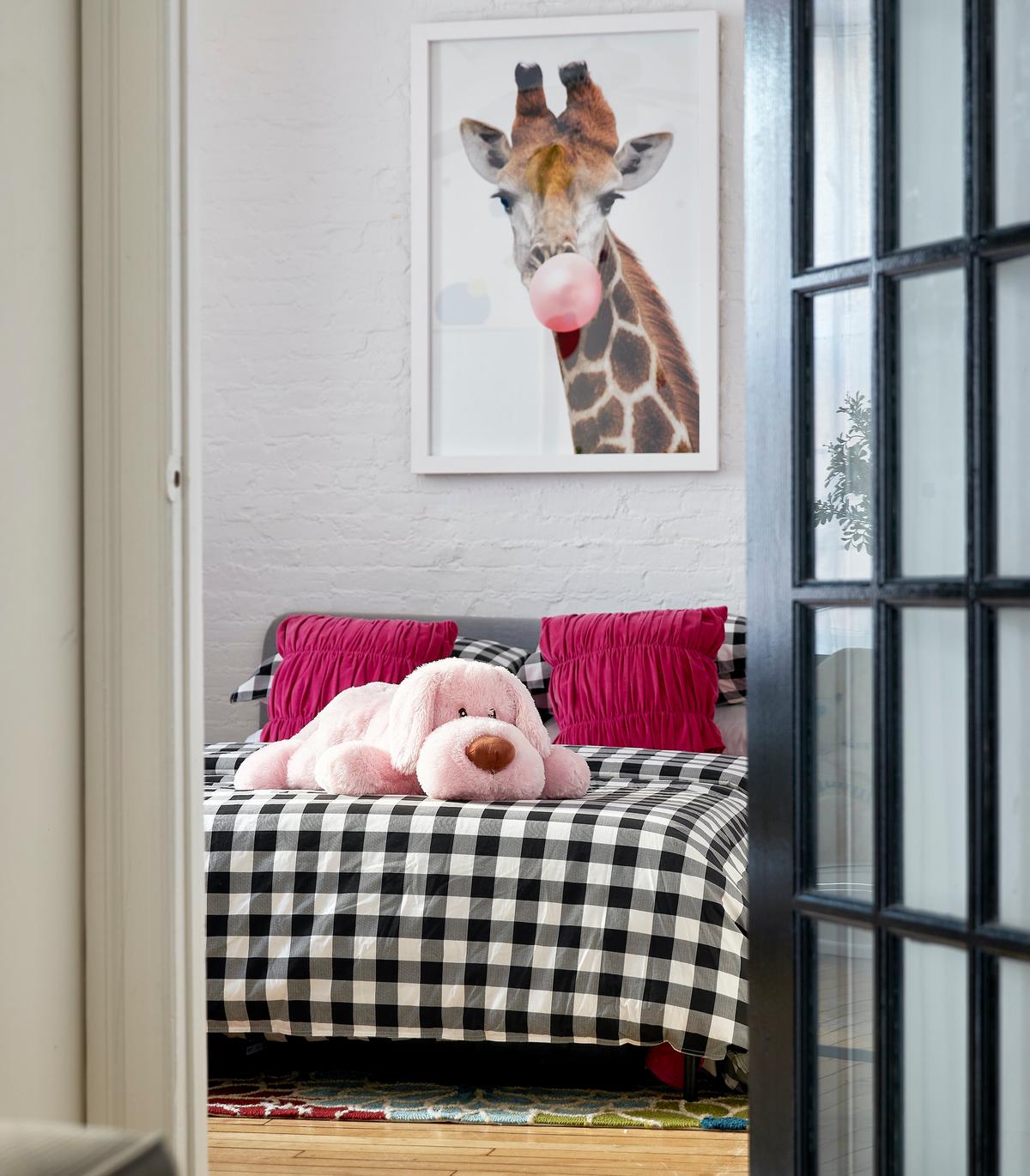 Shades of pink create a fun and festive color scheme in a children's bedroom. (Scott Gabriel Morris/TNS)