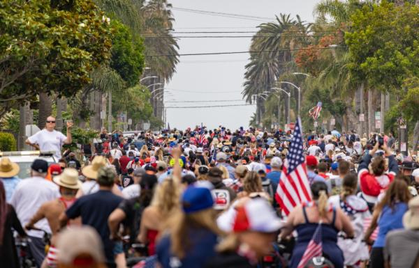 Patriotic locals take part in the 4th Annual 4th of July Bicycle Cruise in Huntington Beach, Calif., on July 1, 2023. (John Fredricks/The Epoch Times)