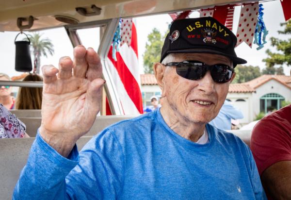 Joe Bush, a 101-year-old U.S. Navy veteran, takes part in the 4th Annual 4th of July Bicycle Cruise in Huntington Beach, Calif., on July 1, 2023. (John Fredricks/The Epoch Times)