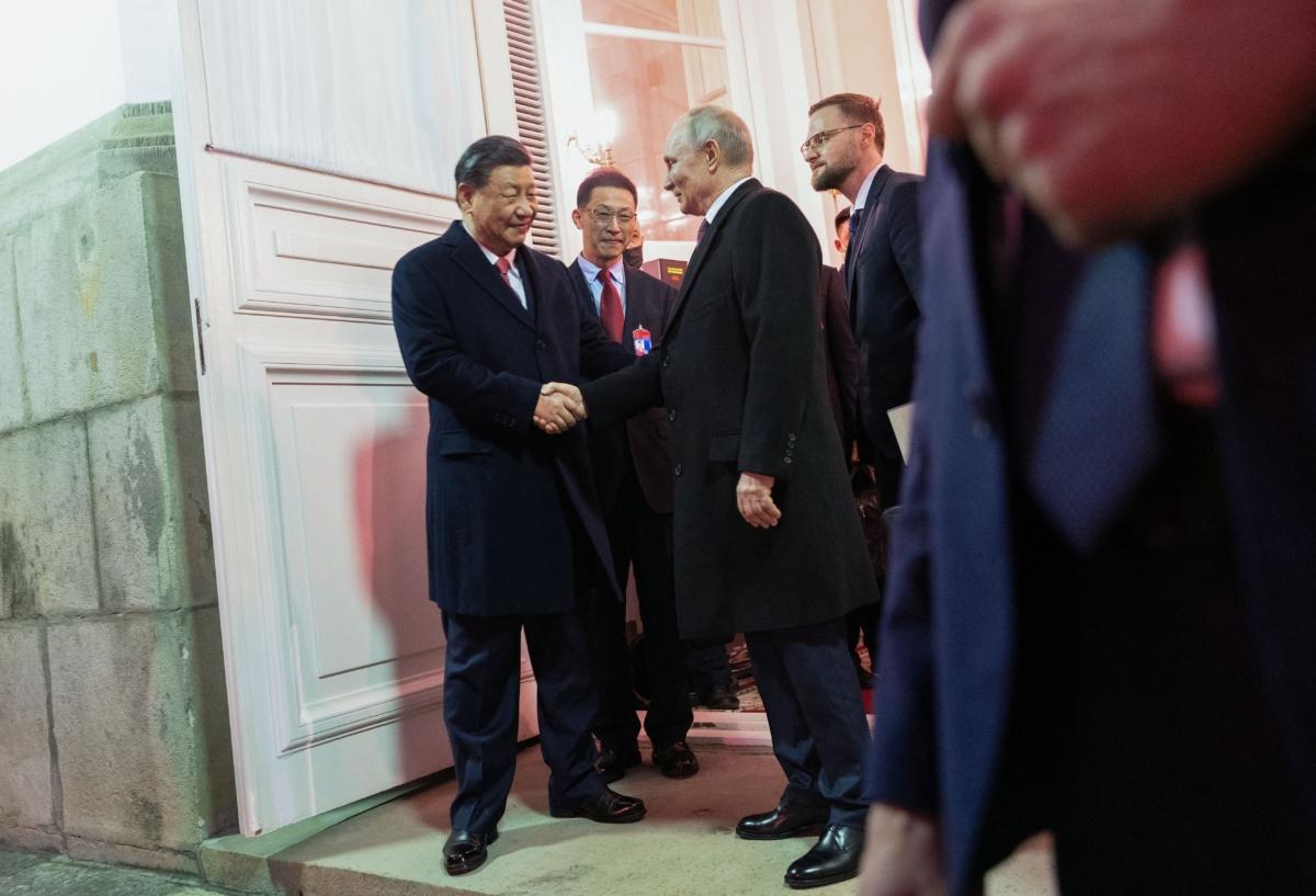 Russian President Vladimir Putin sees off Chinese leader Xi Jinping after a reception following their talks at the Kremlin in Moscow on March 21, 2023. (Pavel Byrkin/SPUTNIK/AFP via Getty Images)