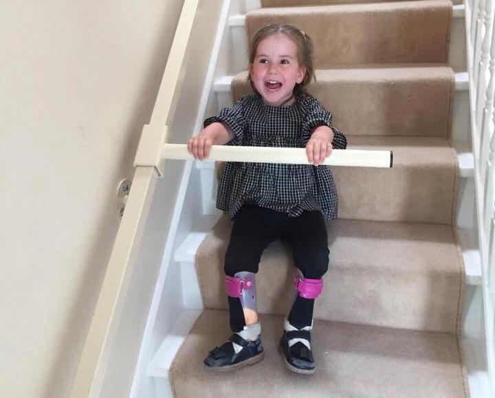 A child using the StairSteady. (Courtesy of <a href="https://www.ruthamos.com/">Ruth Amos</a>)