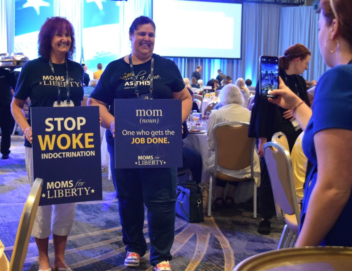 Attendees at the Moms for Liberty National Summit pose for a photo in Philadelphia on July 2, 2023. (Beth Brelje/The Epoch Times)