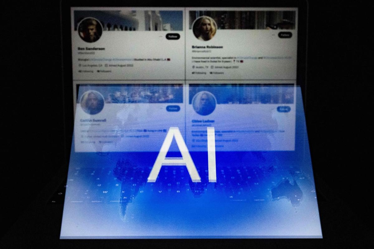 An artificial intelligence (AI) logo blended with four fake Twitter accounts bearing profile pictures apparently generated by artificial intelligence software taken in Helsinki, Finland, on June 12, 2023. (Olivier Morin/AFP via Getty Images)