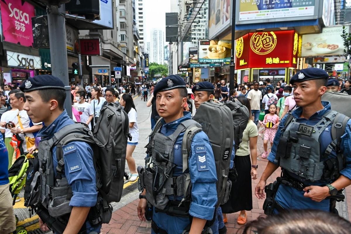A police anti-terrorist squad in Causeway Bay. July 1, 2023. (Sung Pi-Lung/The Epoch Times)