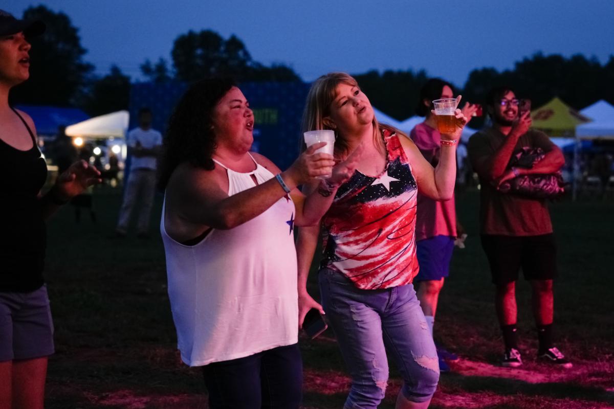 People dance as Keith Anderson performs at America the Beautiful Festival in Deerpark, N.Y., on July 1, 2023. (Samira Bouaou/The Epoch Times)