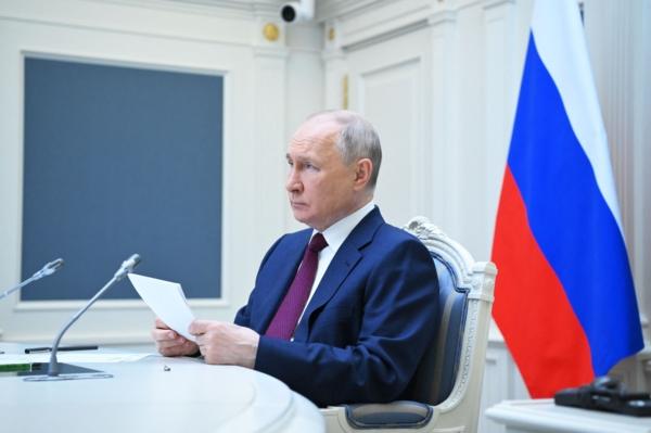 Russian President Vladimir Putin attends a meeting of the Shanghai Cooperation Organization Heads of State Council via a video conference at the Kremlin in Moscow on July 4, 2023. (Alexander Kazakov/SPUTNIK/AFP via Getty Images)