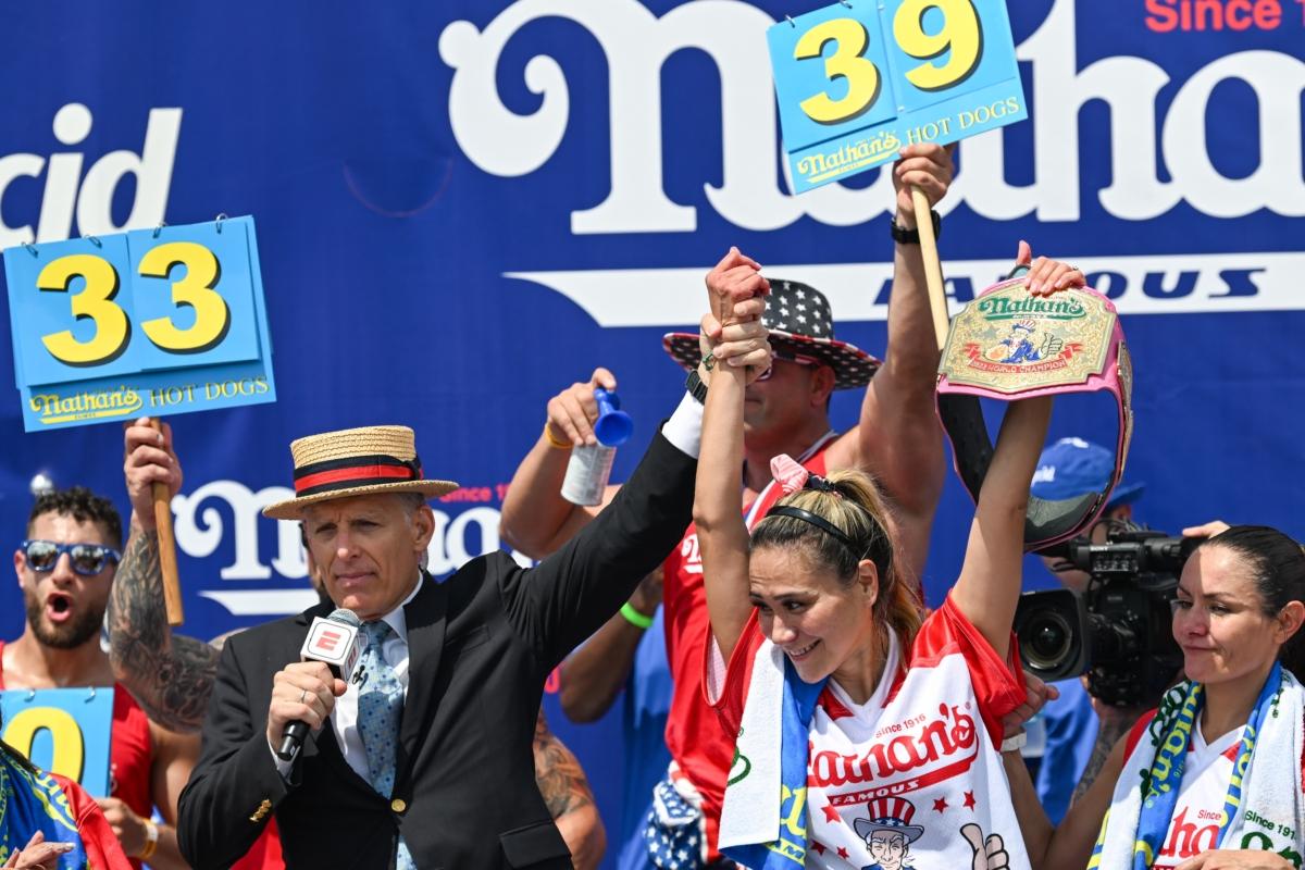 Champion Miki Sudo is declared the winner during the 2023 Nathan's Famous Fourth of July International Hot Dog Eating Contest in the Coney Island section of the Brooklyn borough of New York on July 4, 2023. (Alexi J. Rosenfeld/Getty Images)