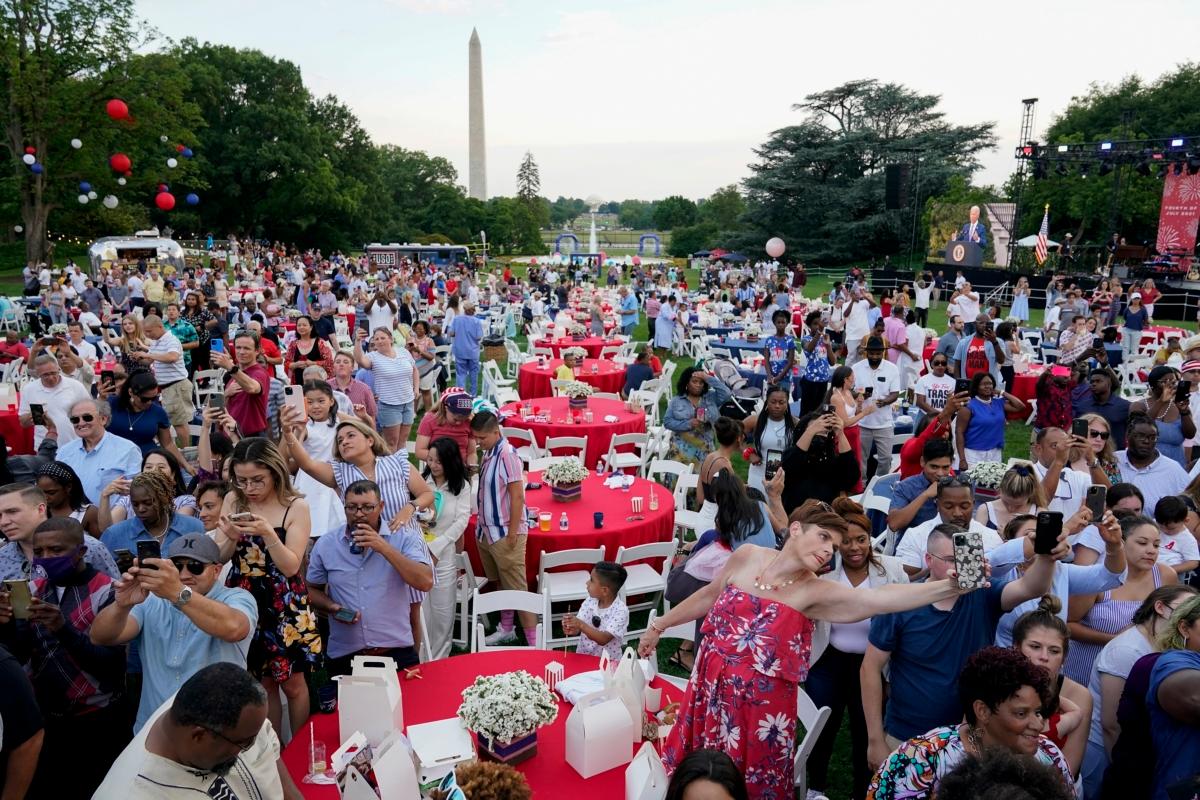 Attendees listen as President Joe Biden speaks during an Independence Day celebration on the South Lawn of the White House on July 4, 2021. (Patrick Semansky/AP Photo)