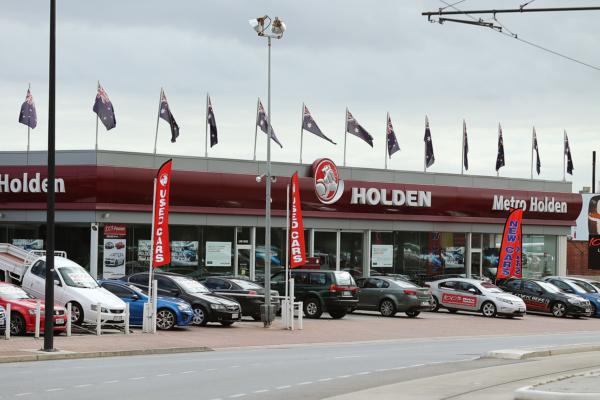 Holden cars stand for sale at a dealership at Thebarton in Adelaide, Australia, on July 30, 2013. (Morne de Klerk/Getty Images)