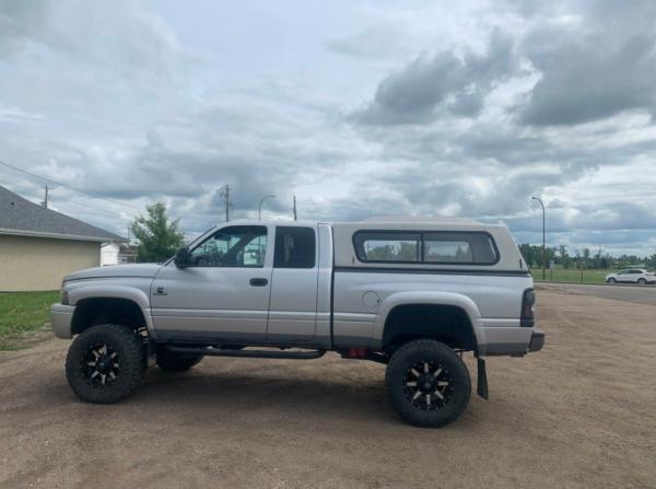 Alberta storm chaser Tom Graham chases storms in a 2001 lifted Dodge Ram Cummins with heavy-duty, off-road 35-inch tires. (Courtesy of Tom Graham/@Washed_Up on Twitter)