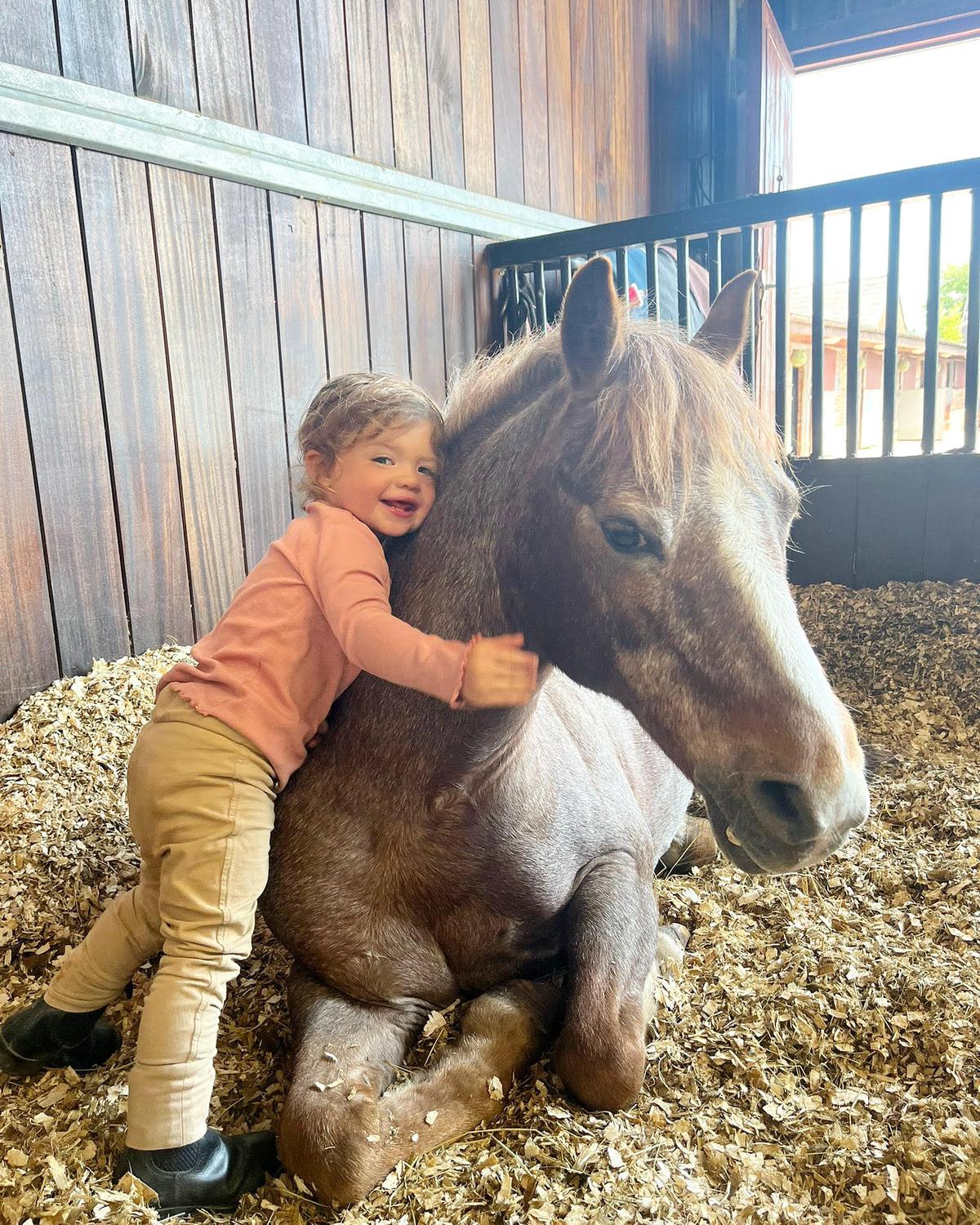 Winter Howley hugging her horse. (Courtesy of Morgan Kent)